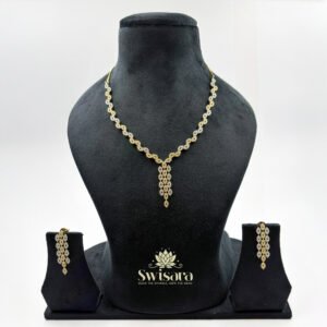 Swisara Aabha Cascading Leaf Necklace Set with gold-tone finish and matching earrings – Swisara