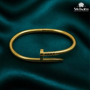 Bolt Curve Nail Bangle in polished gold-tone finish with curved nail design – Swisara