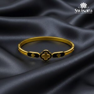 Noir Emblem Luxe Bangle with gold-tone finish and black enamel clover design – Swisara