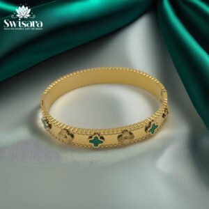 Emerald Grace Clover Bangle with gold beaded edges, floral motifs, and green enamel clover design – Swisara