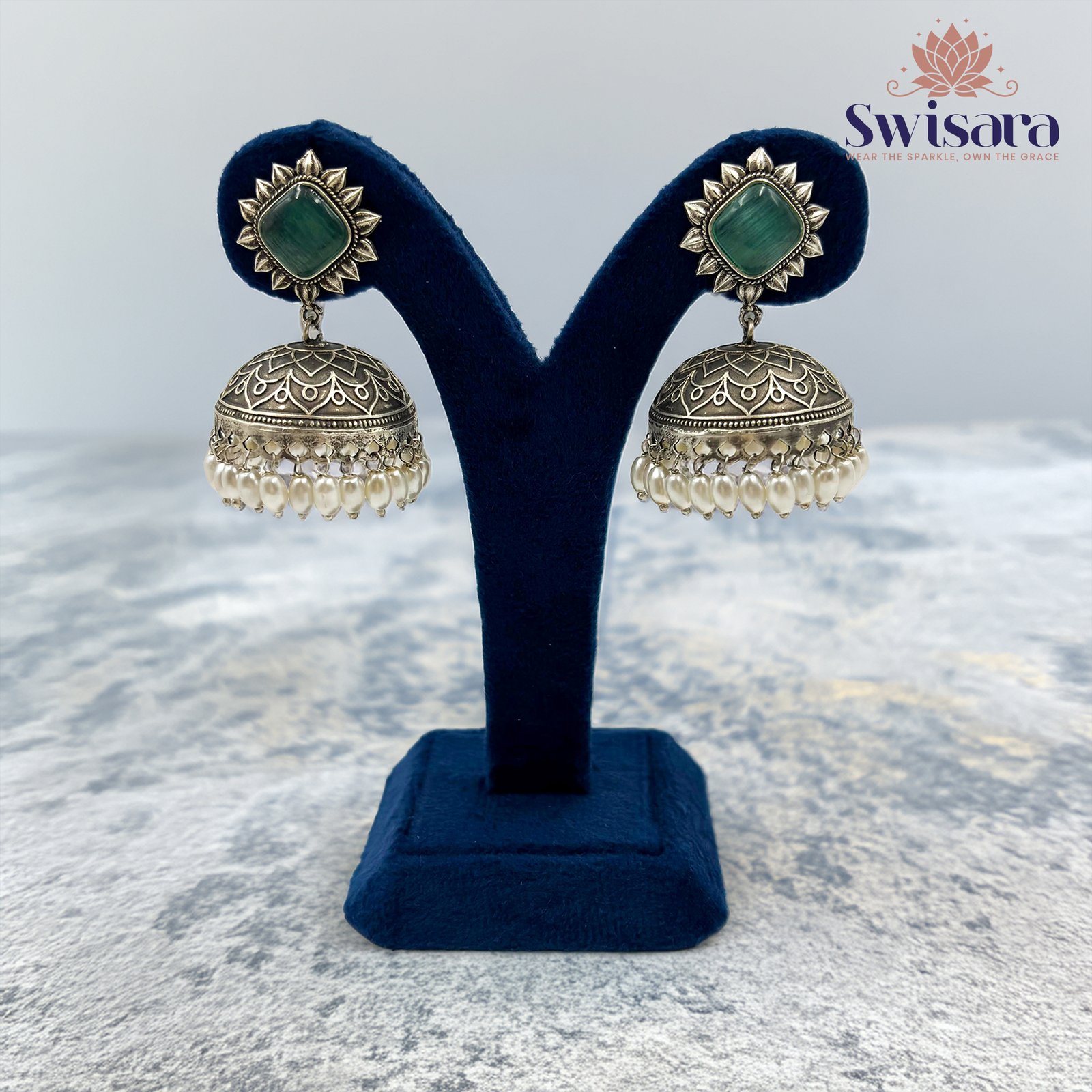 Emerald Glow Dual-Tone Jhumka Earrings