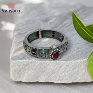 Swisara Antique Ruby Accent Kada with oxidised silver finish and multicolour enamel accents featuring ruby-toned stone